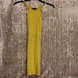 Beautiful yellow dress with slightly opening on side design